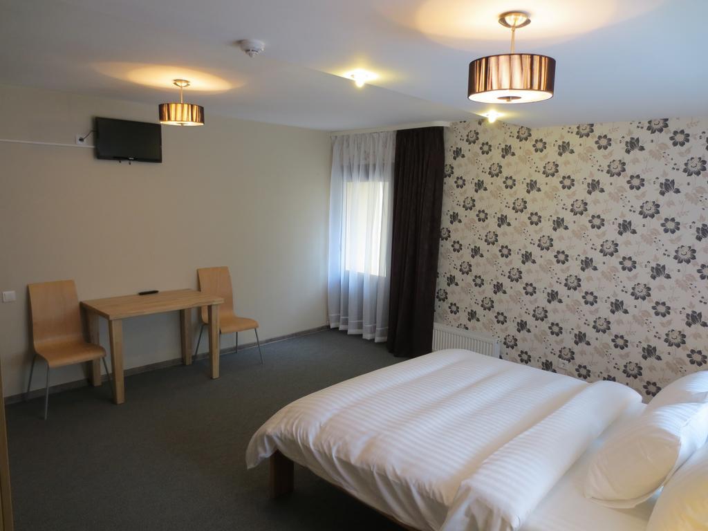 Amigo Hotel Riga Habitación foto
